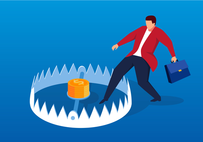 Businessman entering bear trap